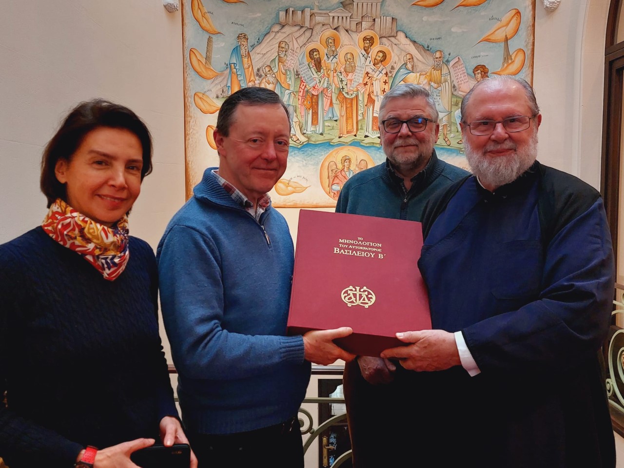 De overhandiging van het facsimile van de Menologe van Basilius II aan de Bollandisten in Brussel