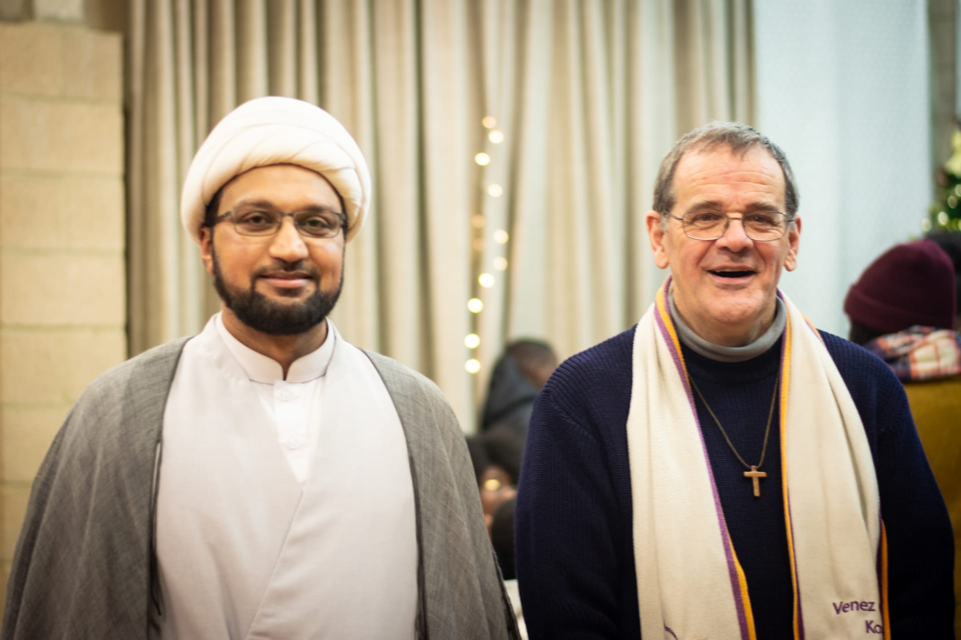 Sjeik Tassawar van de Jaffaria-moskee in Sint-Jans-Molenbeek en pastoor Marc Leroy van de Sint-Annaparochie in Koekelberg